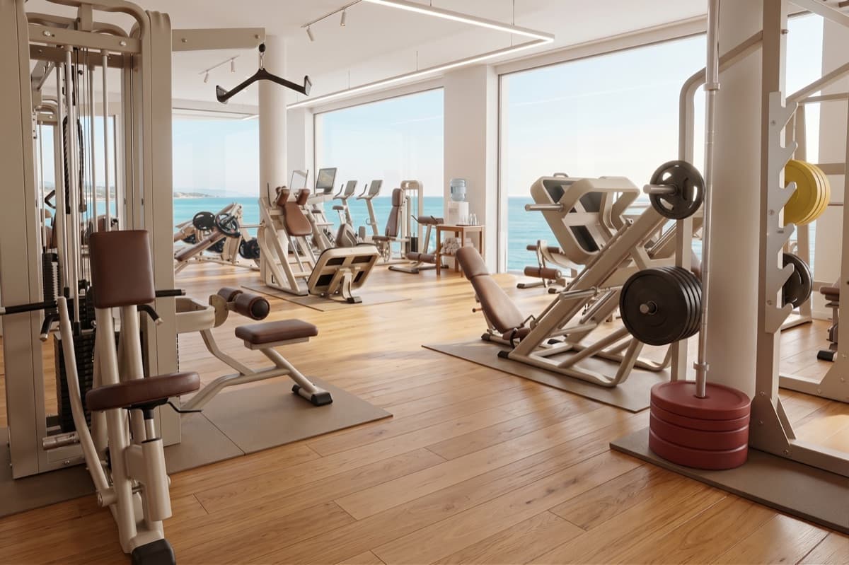 Mockup design van een luxe hotelfitness met uitzicht op zee